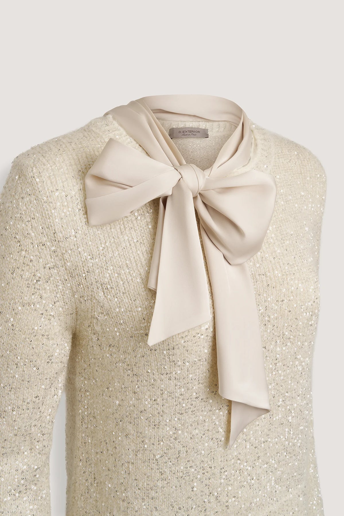 Maglia con paillettes e fiocco di raso Latte