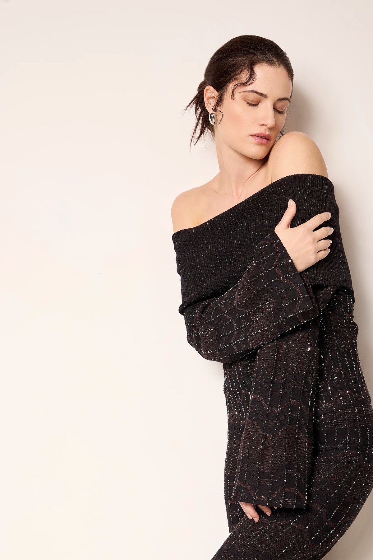 Maglia manica campana con lavorazione geometrica e paillettes Nero